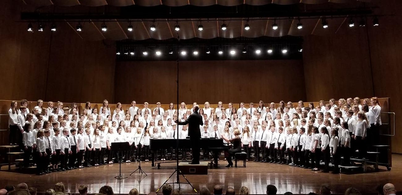 Amir Zaheri conducting an all-state choir