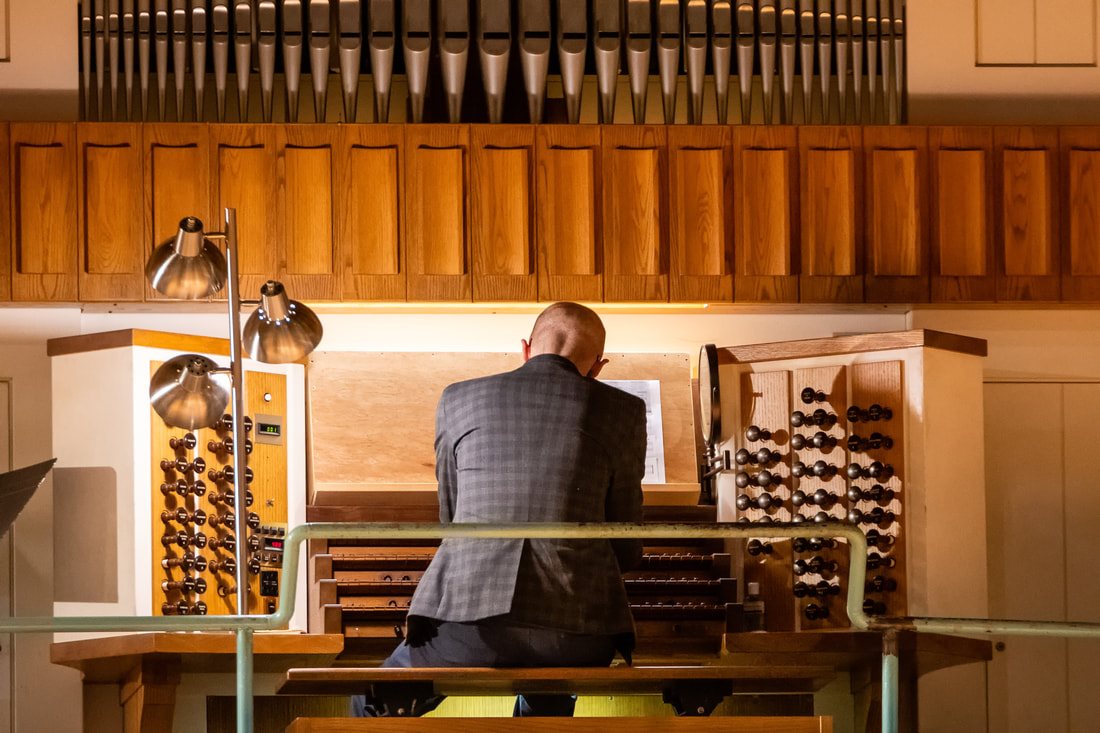 Amir Zaheri at the console of the Mighty Holtkamp Organ